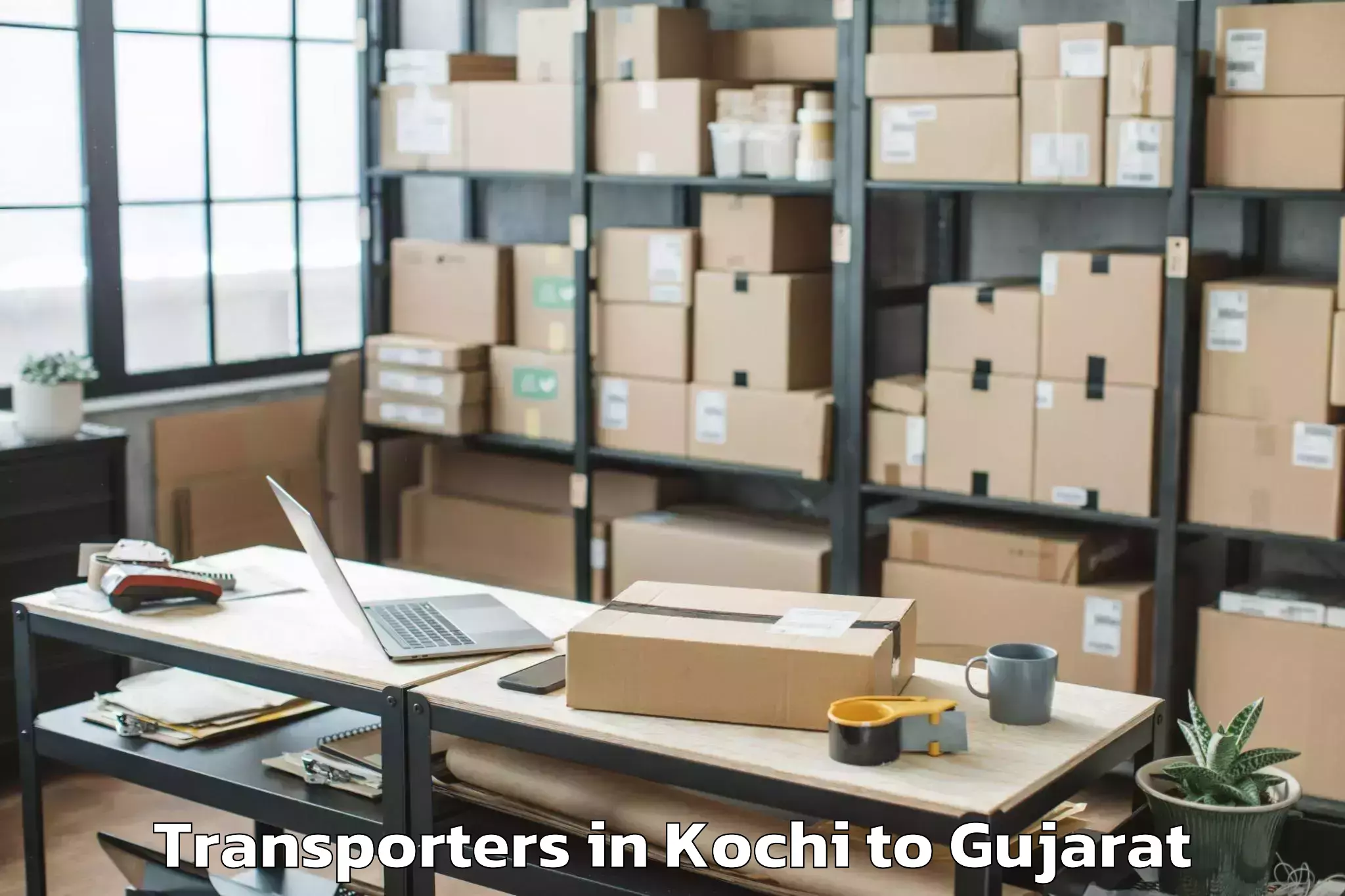 Top Kochi to Keshod Transporters Available